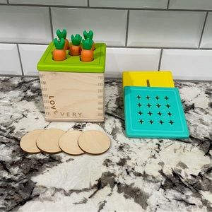 Lovevery Carrot Drop, Coin Lid, and Posting Lid. From The Babbler Set